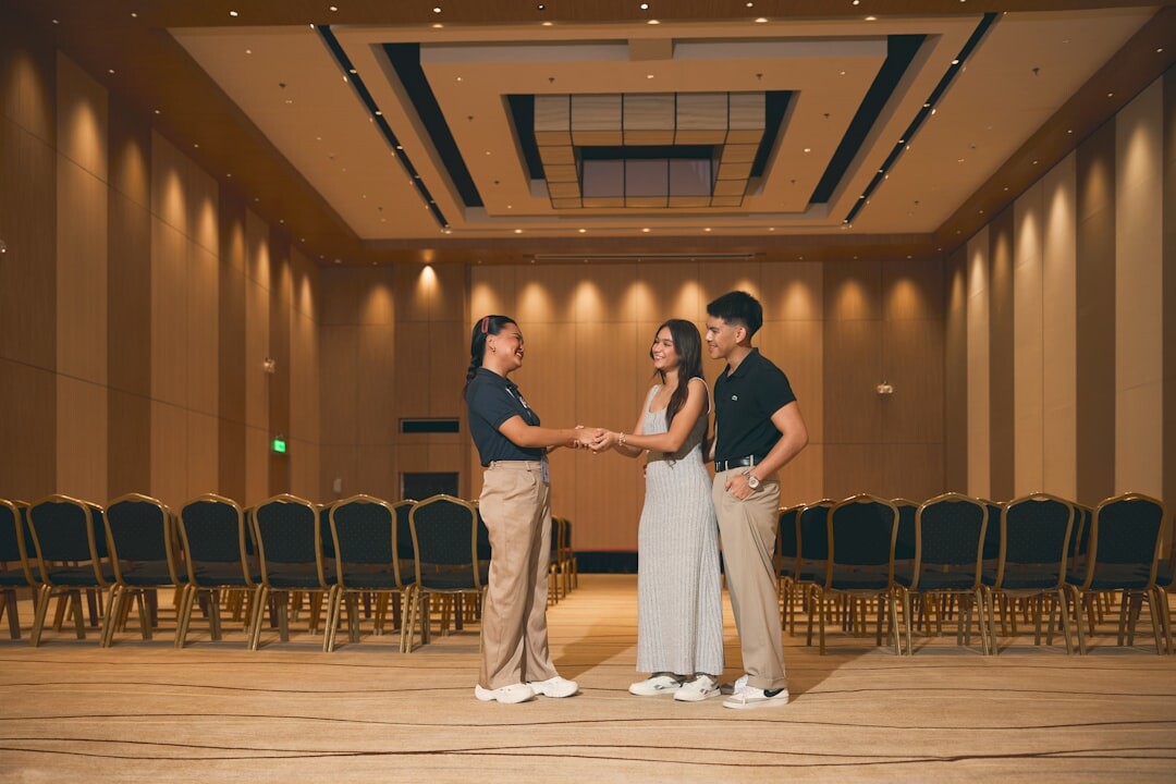 business leaders shaking hands at conference