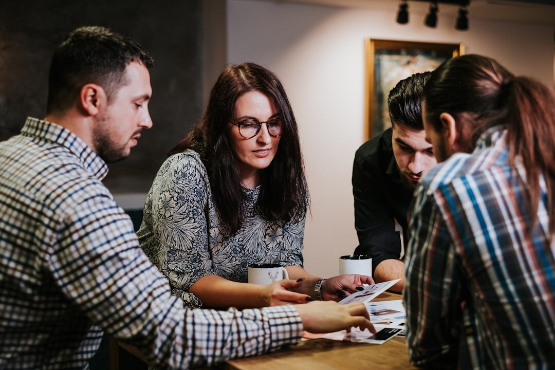 people exchanging business cards at conference